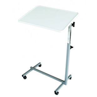 A TABLE ABOVE THE BED