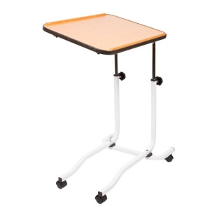 A TABLE ABOVE THE BED