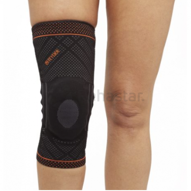 Reinforced knee brace with silicone pad